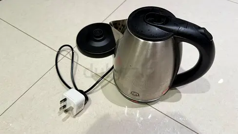 Electric stainless steel kettle with base - used, working