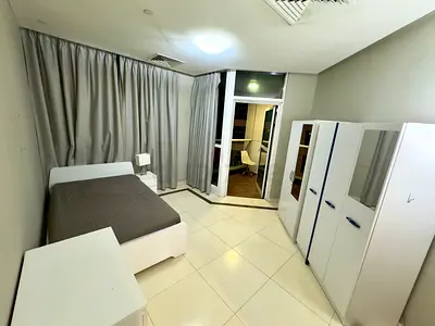 Room for Rent at 23 marina tower with attached balcony at neat and clean apartment