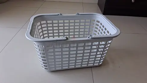 Plastic basket with handles
