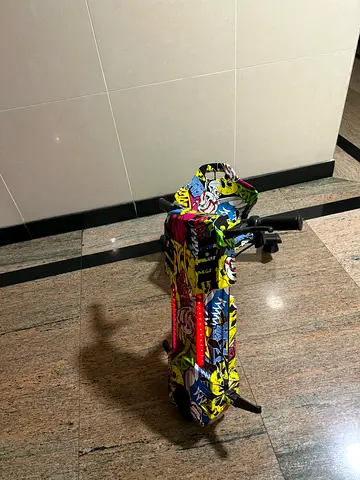 Kids three-wheel electric scooter with LED lights — good condition