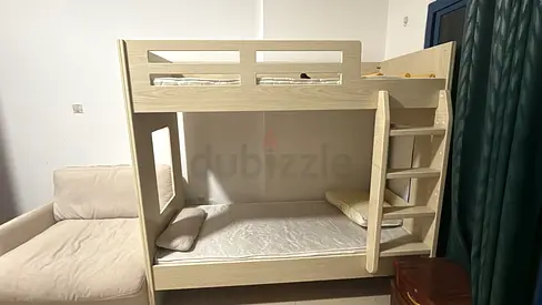 Solid wooden bunk bed with ladder - light wood finish