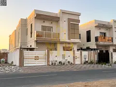 Luxury villa for sale in Al Zahia, Ajman | Two floors | 5 master bedrooms | Land area 3,014 sq ft |