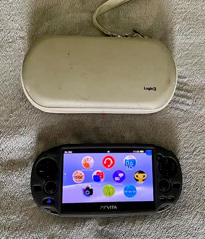 PS Vita OLED 3G/WiFi - PCH-1100 - With Pouch + 8GB Memory Card + Silicon Protector.
