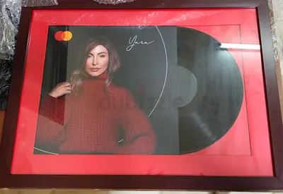 Framed Yara mastercard priceless experience portrait with vinyl display
