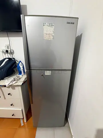 Silver double-door refrigerator - good working condition