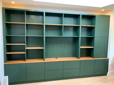Custom Built-in Green Wood Entertainment Wall Unit with Storage