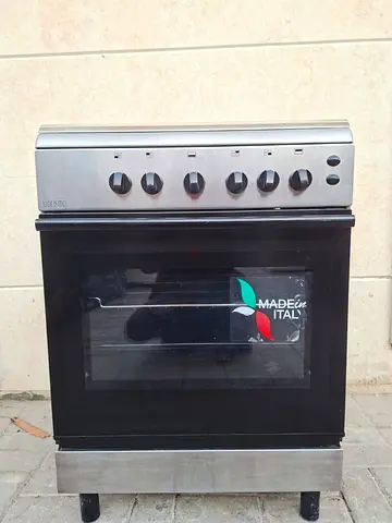 This perfect working,  Bompani Gas Cooker,  size 60x60cm,  with 4 burners