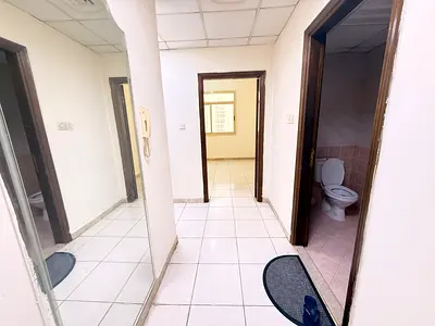 Superb One Bedroom hall with 2 washrooms in building near Al Wahdah Mall