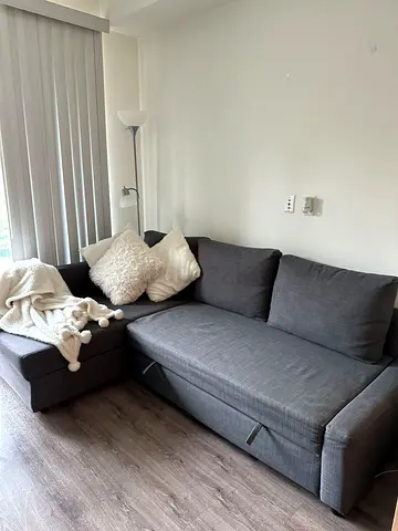 Gray L-shaped Sofa Bed with Chaise - Good Condition