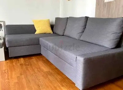 Grey L-shaped Sofa Bed with Storage - Good Condition