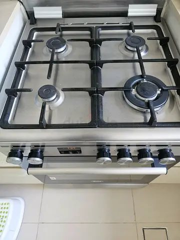 Freestanding stainless steel gas oven with burners - good working condition