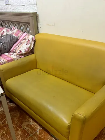 Compact two-seater yellow sofa - good condition