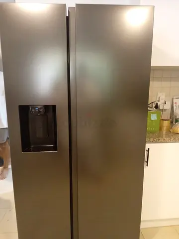 Side-by-side refrigerator with water dispenser - good condition