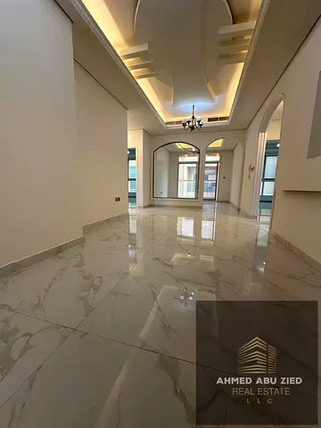 Luxury 2BR apartment in Al Mowaihat 3 with hall, 2 baths, open view, wardrobes, gym, pool, spacious kitchen, modern finish, near services, rent 50,000
