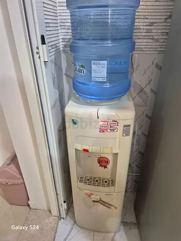 Standing water dispenser with bottled cooler - used, good working condition