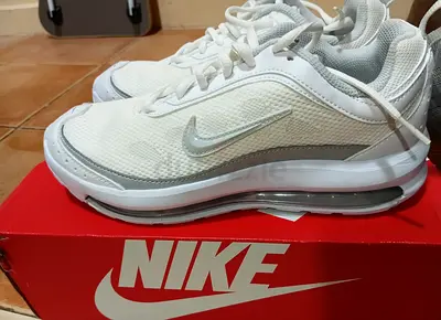 White Nike Air Max mens sneakers, lightly used, size not specified