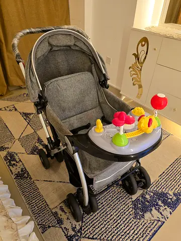 Grey Baby Stroller with Activity Toy Tray