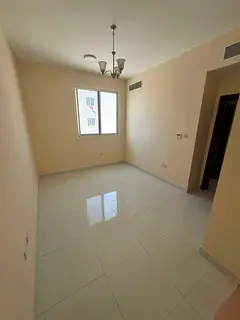 New one-bedroom apartment in Al-Aliya, behind Al-Bayt Al-Mutawhid. Card access system.