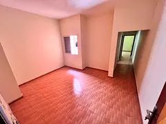 One bedroom and living room - near Kenz Mall and Sheikh Ammar Street - 1 bathroom - split air condit