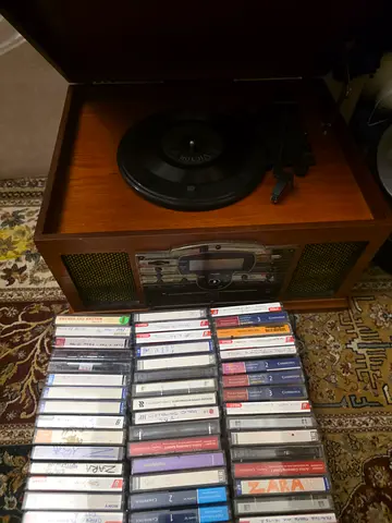 Vintage Wooden Turntable Record Player with Cassette Deck and Tape Collection. AED 350 Only.