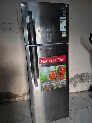 Stainless Steel Side-by-Side Refrigerator in Good Condition