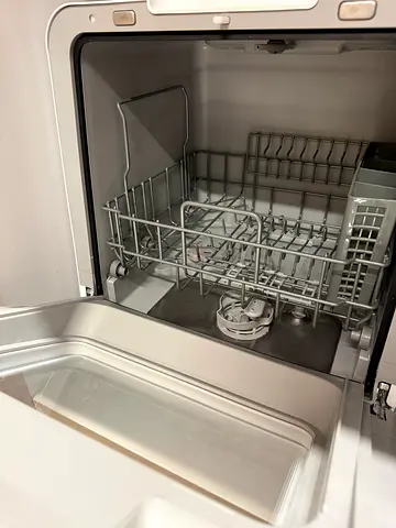 Compact dishwasher in good working condition.