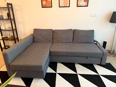 Grey L-shaped Fabric Sofa with Storage - convertable into a kingsize bed.Good Condition