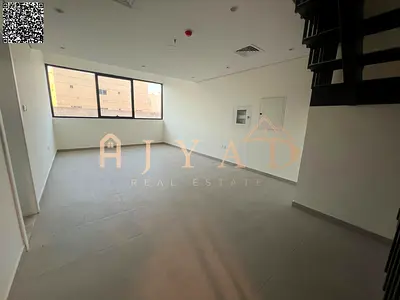 2BR duplex hall for annual rent in Al Helio 2, Ajman. Built-in wardrobes, central AC, 3 baths, hotel finish, near Dubai exit.