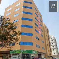 For Sale: Residential and Commercial Building in Sharjah – Al Butinah Area