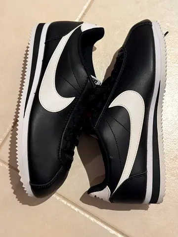Black and white Nike Cortez sneakers - unisex.
