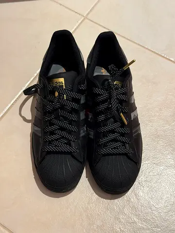 Black Adidas Superstar sneakers - size US 8.5, UK 8, EUR 42. Never Used