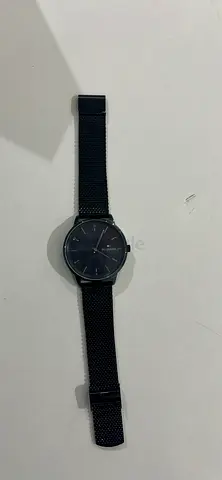 Black minimalist mens wristwatch with mesh strap