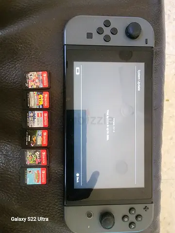 Nintendo Switch console with 6 game cartridges (working, updated)