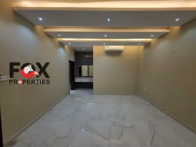 Villa for sale or rent in Al Yasmin, 5 master bedrooms, 2 living rooms, yard, and electricity. Sale