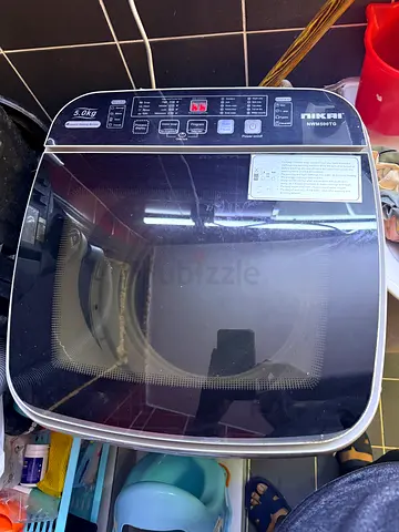 Used top-load washing machine in good working condition