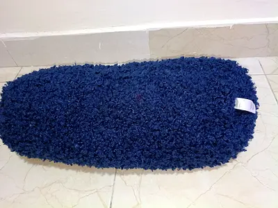Navy blue shaggy bathroom/rug mat - good condition