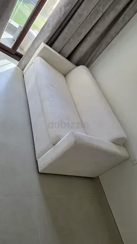 Natuzzi two seater sofa bed with mattress