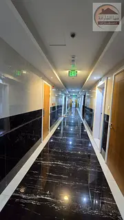 For rent in the Al-Hoshi area on Maliha Street. An apartment with two rooms, a living room, two bath