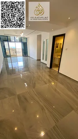 For annual rent in Ajman Two bedrooms and a living room with two bathrooms and a balcony with an op