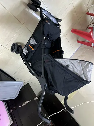 Lightweight black umbrella stroller in good condition