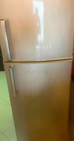 Silver double-door refrigerator, excellent working condition used like new