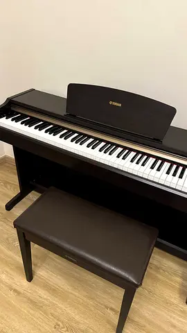 Yamaha YDP-143 electric piano