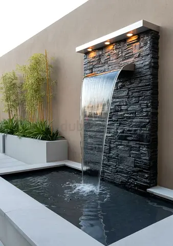 Modern Outdoor Waterfall Feature with Lighting