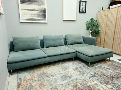 Light teal L-shaped fabric sofa with chaise, 3-seater