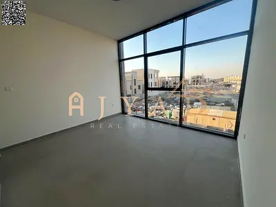 1BR apartment for annual rent in Al Helio 2, Ajman. Panoramic view, central AC, built-in wardrobes, balcony, open kitchen, easy payments.