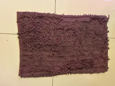 Small purple textured bath mat / rug - gently used
