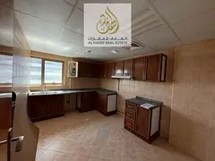 Annual rent in Ajman, Al Rashidiya 3, next to Grand Mall. Two bedrooms, living room, balcony, 3 bath