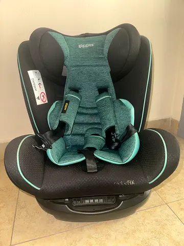 Used rarely for less than 6 months, kiddy convertible car seat in good condition - teal/black