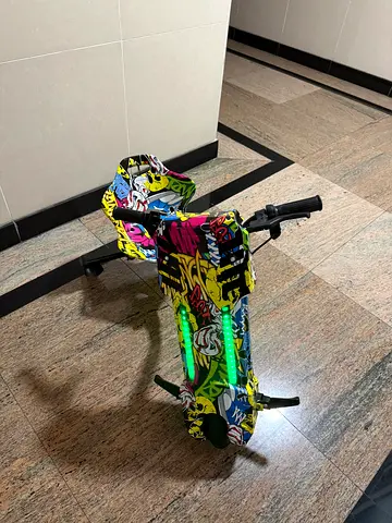 Kids three-wheel electric scooter with LED lights — good condition