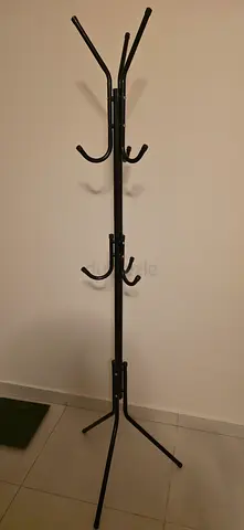 Black metal standing coat rack